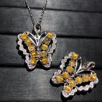 China Cute Gold Rutilated Quartz Butterfly Pendant Healing Crystal Bead Energy Crystal Pendant for sale