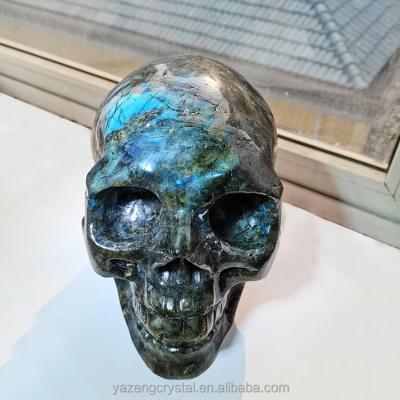 China Free Geographic Custom High Quality Hand Carved Crystal Skulls 9kg Good Design Snap Natural Large Labradorite Crystal Skulls for sale