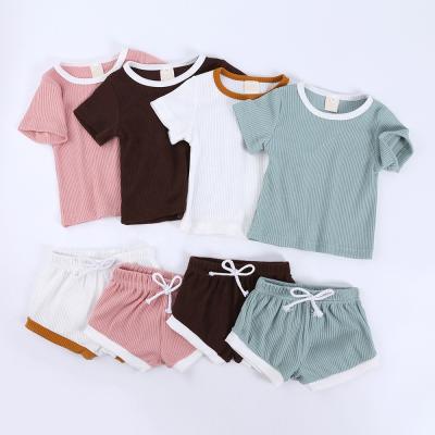 China Hot Sale Solid Color Short Sleeve Baby Clothing Breathable 2 Pieces Ribbed Newborn Baby Clothes Set for sale