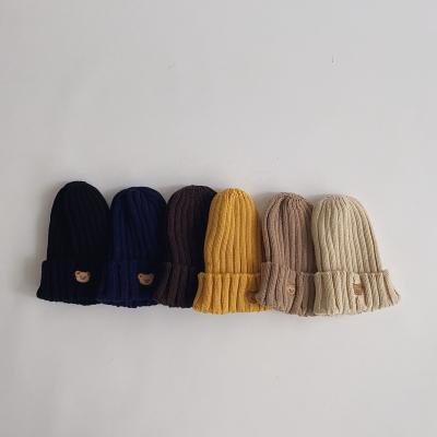 China Wholesale Casual Cheap Customize Kids Knitted Knotted Hood Baby Boy Winter Newborn Hats For Kids Girl for sale