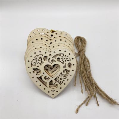 China Europe Slice Heart Shaped Hollow Wood Laser Cut Hemp Rope Decoration for sale