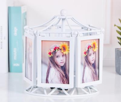 China Morden and Simple Multifunctional Revolving Music Box Photo Frame Set Creative Personality 5 Inch PVC Photo Frame for sale