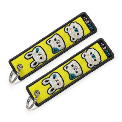 China Custom Embroidered Fabric Key Chain Key Tag Throw Tags for sale