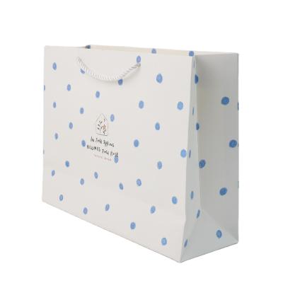 China Manufacturer Recyclable White Luxury Customize Logo Printed Paper Shopping Bags for sale