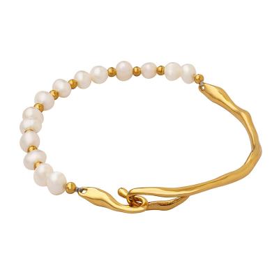 China Vintage Freshwater Pearl Beaded Bracelets For Women 18K Gold Stainless Steel Twisted Bracelet for sale