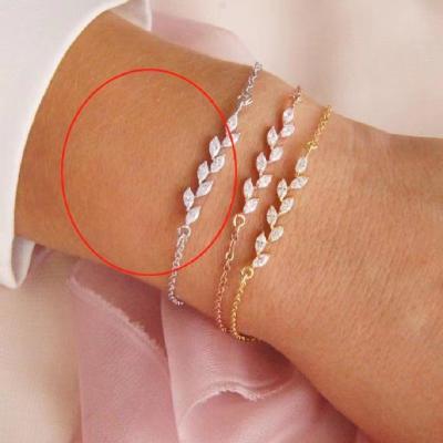 China FASHIONABLE Hot Selling Shiny Zircon Leaves Full Charm Bracelet For Women Copper Chain Bracelets for sale