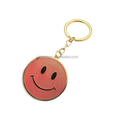 China Cute Custom Hard Yellow Glitter Enamel Key Chain Smiley Face Keychain Gift Eco-Friendly Pink for sale