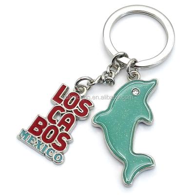 China Factory Nickel Free Metal Soft Enamel Tropical Souvenir Keychain Mexico Souvenirs Sparkles Inside Dolphin Charm Key Chain for sale