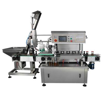 China Automatic Beverage Iron Cover Capping Machine With Vacuum System for sale