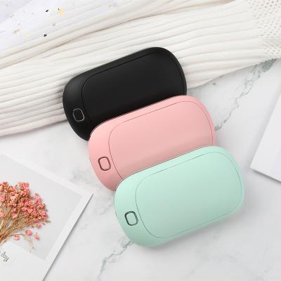 China Electric Power Bank Factory Winter OEM Reusable Battery Phone Mini Heater Hand Warmer Wireless Charger for sale