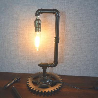 China Bedroom industrial creative table lamp, simple study wrought iron pipe decoration, industrial style table lamp for sale