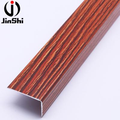 China Contemporary Aluminum Profiles Stair Nosing Edging Flat Step Wood Grain Finish Stair Nose for sale