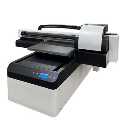 China Flatbed Material SunColor XP600 2 or 3 Heads CMYK+White Vanish Optional 6090 UV Flatbed 3d Printer For Sale for sale