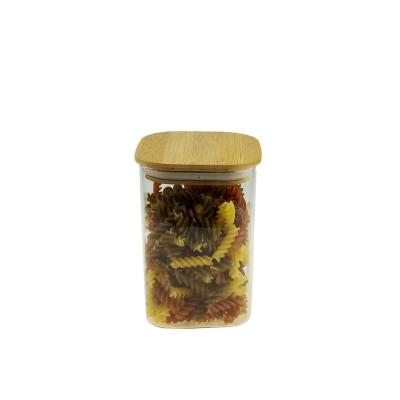 China High Borosilicate 950ml Square Stocked Glass Jar With Wooden Lid for sale