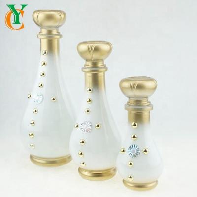 China 200ml 500ml 1000ml Viable Round Glass Liquid Storage Jar With Lid Food Glass Bottle Gold Beads Design for sale