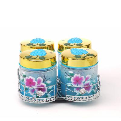 China Stocked Wholesale Glass Candy Cookie Jars Set With Silver Rotating Rack for sale