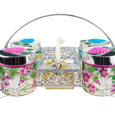 China Freshness preservation 4pcs glass candy jars with lid with metal holder set 700ml jar with handpainting colors for sale