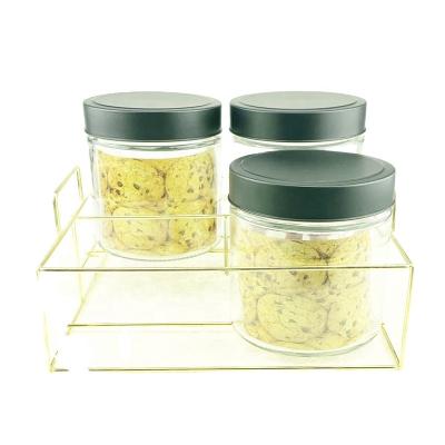 China Clear Freshness Preservation 750ml 26OZ Round Glass Jar With Gold Lid With Holder Set for sale