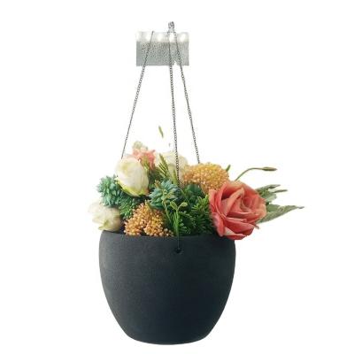 China Pretty Rough Surface Balcony Minimalist High Quality Black Ceramic Wall Basket Hanging Flower Plant Pots for sale