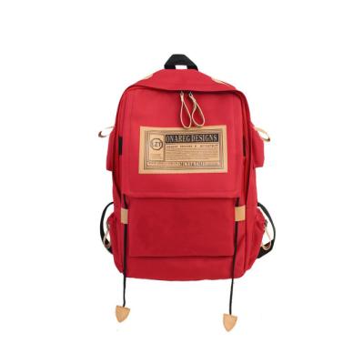 China Hot Selling Large Capacity Canvas Cheap Tourist Backpack Unisex School Bags for sale