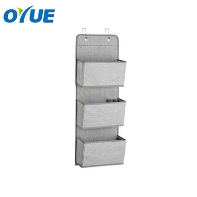 China Sustainable Multifunctional 3 Pocket Folding Non Woven Over The Door Hanging Organizer for sale