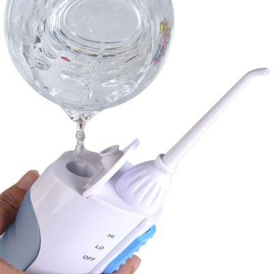 China Commercial Portable Teeth Care Dental Flosser Flossers Cordless Oral Teeth Irrigator for sale