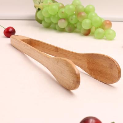 China Unique eco-friendly cooking wooden kichen tongs for toolskichen bamboo tools toast tongs for sale