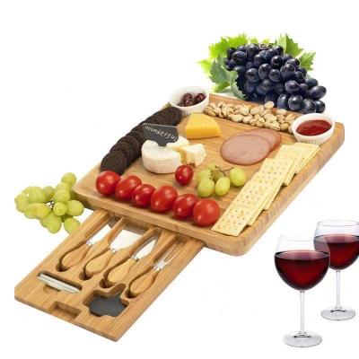 China Sustainable Serving Tray With Solid Bamboo Wood And Food Tray Sliding Out Of Drawer Cheese Cutting Board for sale