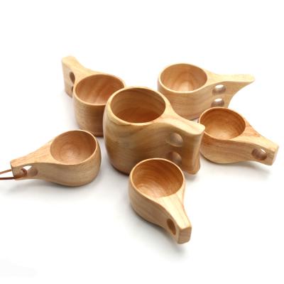 China Sustainable Handmade Wood Grain Natural Solid Wood Cup Nordic Style Tea Cups Milk Breakfast Coffee/Milk Rubber Wood Portable Cups for sale