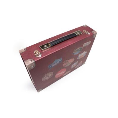 China Recycled Materials Packaging Boxes Custom Paper Ribbon Handle Packaging Box Women Apparel Boxes With Logo for sale