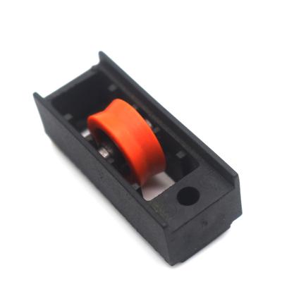 China Modern Plastic PVC Slide Black Windows Rollers For Box Hardware Nylon Accessories for sale