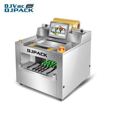 China Semi Automatic Vegetable Food Tray Machine DJF-450T Tray Wrapper Food Tray Wrapper for sale