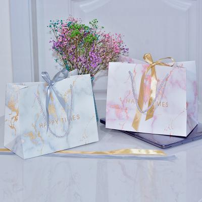 China Custom Logo Recyclable Custom Logo Gift Bag Jewelry Candy Wedding Ribbon Tie Ribbon Royal Blue Pink Marble Paper Bags For Apparel Packaging for sale