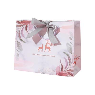 China JuYi Recyclable Custom Deer Printed Ribbon Luxury Waterproof Bow Tie Handle Jewelry Wedding Gift Packaging Shopping Paper Bag for sale