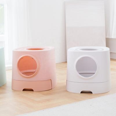 China Included Hole Stored Cat Toilet Litter Box Multi Function Pet Trash Tree Cat House With Scratch Board for sale