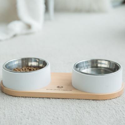 China 5.5 in. stainless steel pet bowl. in diameter and viable feeders Cat Dog Pet Water Bowl with wooden base for sale