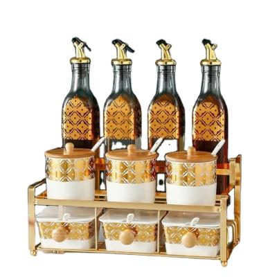 China Microwavable Well Organized Condiment Sets Ceramic Spice Box Seasoning Jars And Oil Vinegar Glass Bottles Set With Wooden Drawer Rack Kitchen for sale