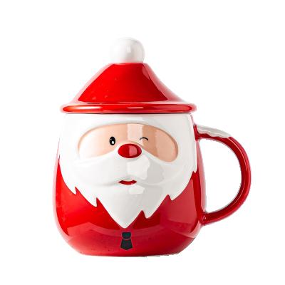 China Viable Christmas Decorative Funny Coffee Mug With Lid And Spoon Ceramic Santa Head Beverage Drinking Mugs Classic New Year Gift for sale