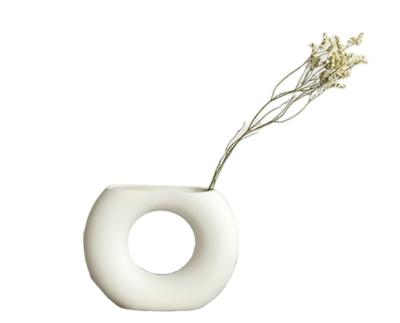 China Modern Minimalism White Decorative Vases Nordic Style Porcelain Flower Vase White Ceramic Unique Irregular Design For Wedding Centerpieces for sale