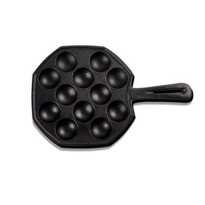 China Many Holes Cast Iron Octopus Skillet Sustainable Cast Iron Cookware for sale