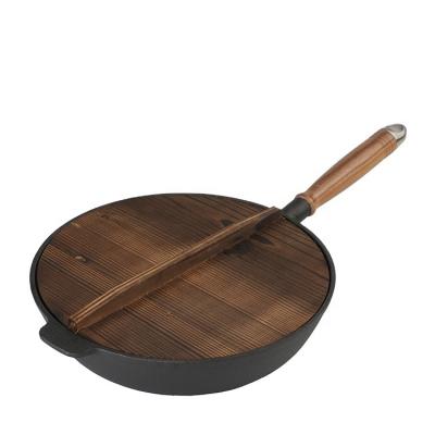 China Sustainable Cast Iron Handle Gas Chinese Wok Pan Wooden Wok for sale