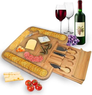 China Viable Hot Selling Large Bamboo Cheese Cutting Board With Tray Natural Kitchen Charcuterie Set Knife Chopper for sale