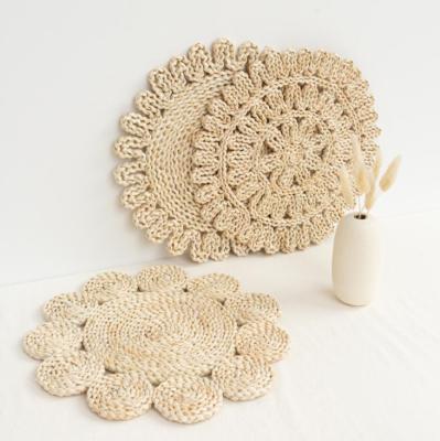 China Viable Natural Hollow Placemat Rattan Color Wicker Charger Plates For Holiday Christmas Kitchen Table Mat Round Woven Placemats for sale