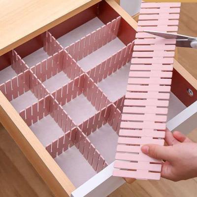 Cina 4pcs/lot Bathroom Drawer Storage Divider Free Combination Can Be Wrought Plastic Drawer Cabinet Divider in vendita