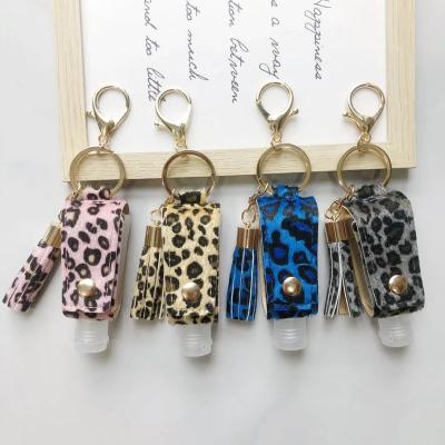 China New PU Leather Ready To Ship Leopard Print Leather Tassels Spray Bottle Holder Hand Sanitizer Bottle PendBottleant Handbags With 30ml for sale