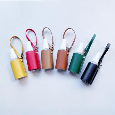 China PU Leather New Ready To Ship Hand Sanitizer Bottle Leather Handbags Spray Bottle Holders Pendant With 60ml Bottle for sale