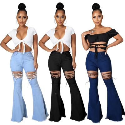 China New Arrivals Breathable Ripped Jeans High Waist Hollow Out Pants Rocket Jean Denim Pants Women Bandage Pants For Women for sale