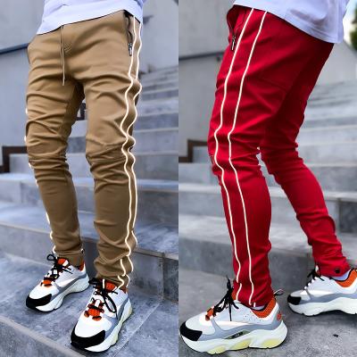 China Anti-wrinkle plus size men's pants slim pants long summer men's sweatpants casual reflective running sportswear men's slim pants for sale