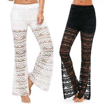 China Anti-wrinkle holiday crochet bell-bottom lace sheer pants for women dress net black split lace gaiters for women for sale