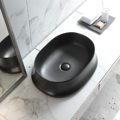 China Easy Clean Wash Basin Hotel Using Deck Mounted Color Ceramic Lavatory Sink Black Hand Wash Basin for sale